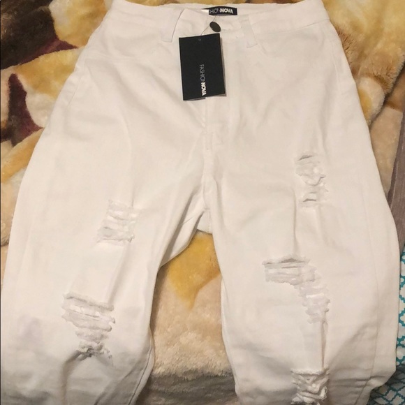 Unworn white cut up jeans from fashion nova. - Picture 3 of 5